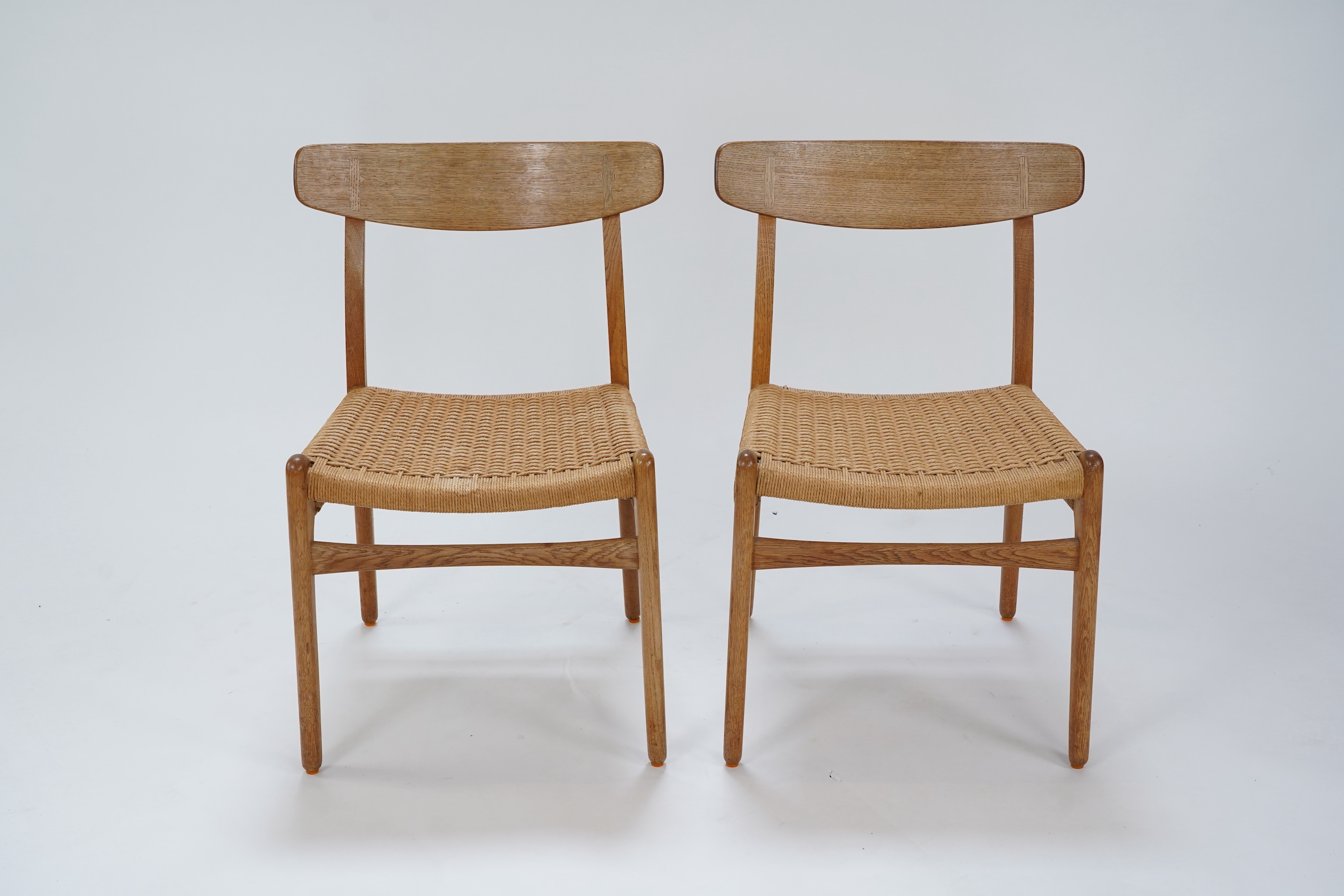 Hans Jørgensen Wegner (Danish, 1914-2007) for Carl Hansen & Søn Møbelfabrik : Two oak 'CH23' dining chairs